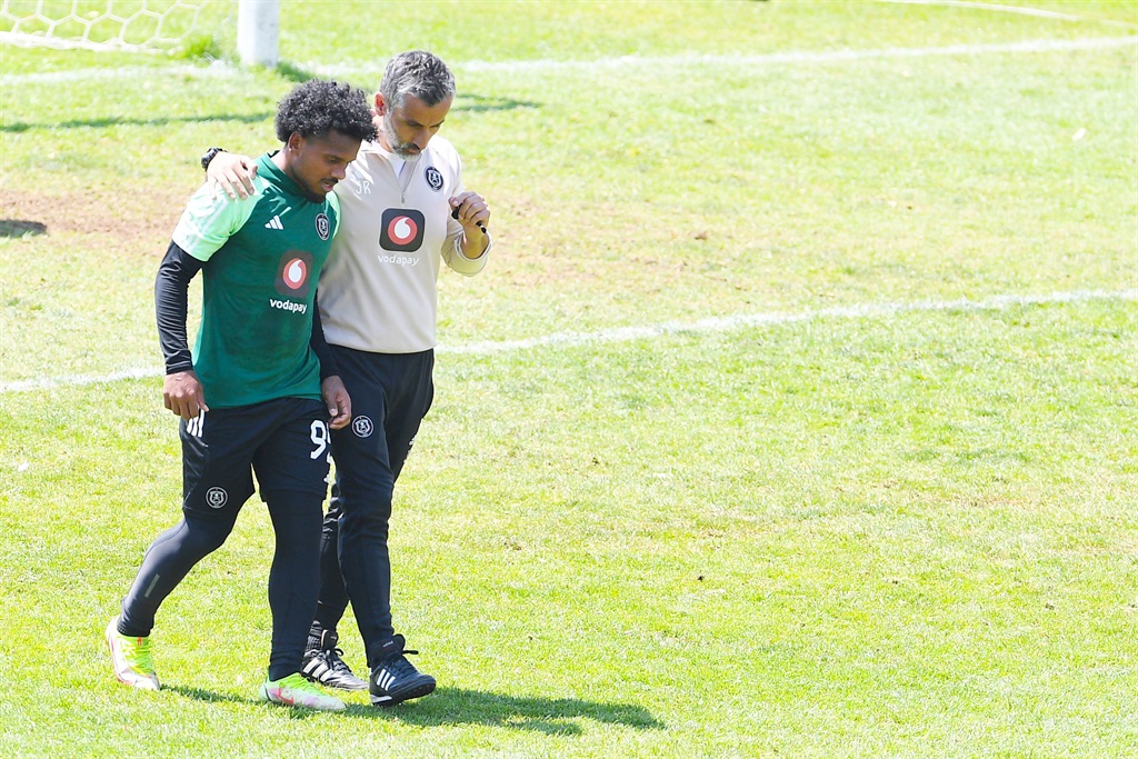 JOHANNESBURG, SOUTH AFRICA - OCTOBER 03: Kermit Erasmus of Orlando Pirates and Jose Riveiro during the Orlando Pirates media open day at Rand Stadium on October 03, 2023 in Johannesburg, South Africa. (Photo by Lefty Shivambu/Gallo Images)