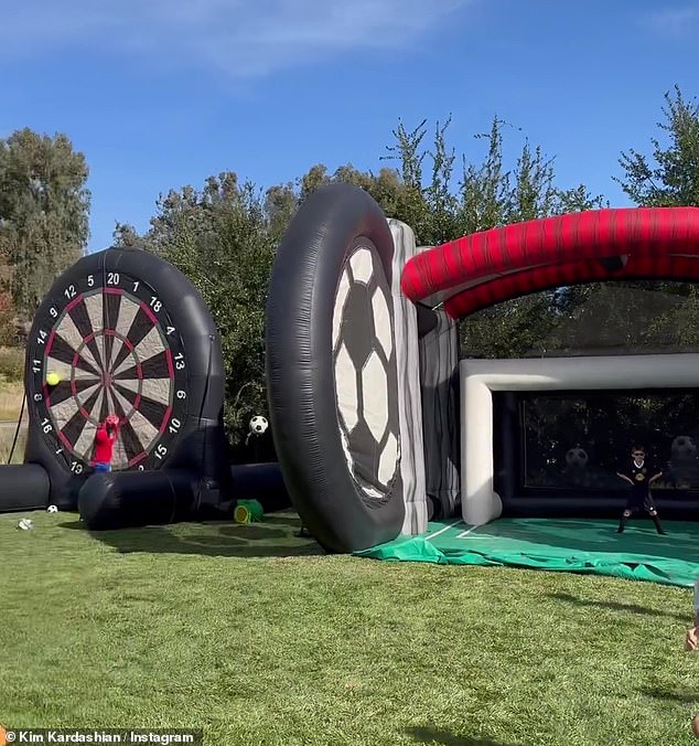 Saint and his friends ran around the backyard which was filled with several bounce houses as well as setups that helped them work on their soccer skills such as kicking and goal scoring