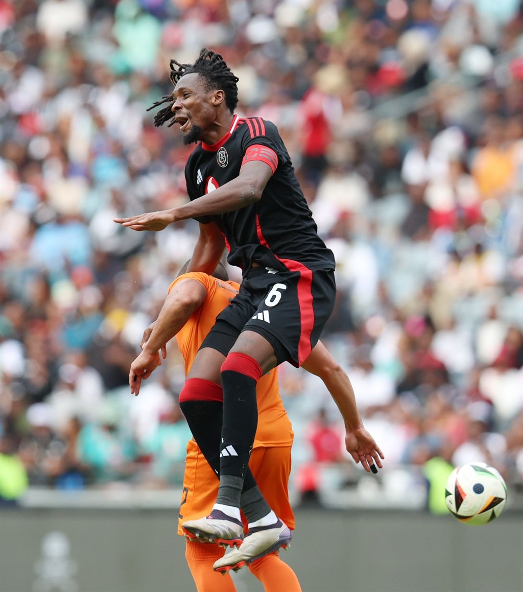 Olisa Ndah of Orlando Pirates challenged by Cole Alexander of Polokwane City during the Betway Premiership 2024/25 match between Orlando Pirates and Polokwane City at the Orlando Stadium, Soweto on 24 September 2024 