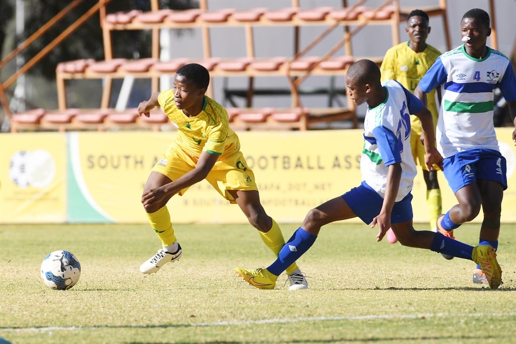 JOHANNESBURG, SOUTH AFRICA - AUGUST 16:  Neo Bohloko of South Africa  and Karabo Lethoko of  Lesotho during the U17 International Friendly match between South Africa and Lesotho at UJ Soweto Stadium on August 16, 2024 in Johannesburg, South Africa. (Photo by Lefty Shivambu/Gallo Images)