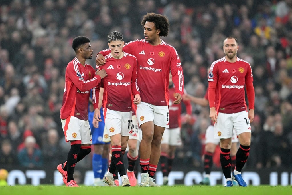 MANCHESTER, ENGLAND - NOVEMBER 10: Alejandro Garnacho of Manchester United celebrates scoring his teams third goal with Amad Diallo and Joshua Zirkzee during the Premier League match between Manchester United FC and Leicester City FC at Old Trafford on November 10, 2024 in Manchester, England. (Photo by Michael Regan/Getty Images)