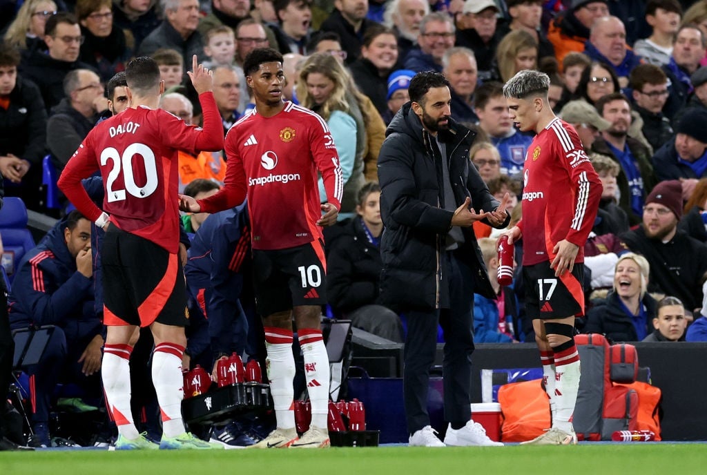 IPSWICH, ENGLAND - NOVEMBER 24: Ruben Amorim, Head Coach of Manchester United, interacts with Alejandro Garnacho of Manchester United as team mates Marcus Rashford and Diogo Dalot look on during the Premier League match between Ipswich Town FC and Manchester United FC at Portman Road on November 24, 2024 in Ipswich, England. (Photo by Richard Pelham/Getty Images)