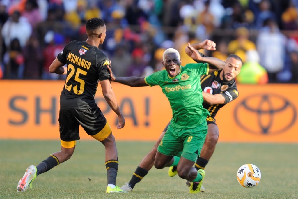 BLOEMFONTEIN, SOUTH AFRICA - JULY 28: Aziz Ki of the Young Africans and Reeve Frosler and Given Msimango of Kaizer Chiefs during the Toyota Cup 2024 match between Kaizer Chiefs FC and Young Africans at Toyota Stadium on July 28, 2024 in Bloemfontein, South Africa. (Photo by Charle Lombard/Gallo Images)