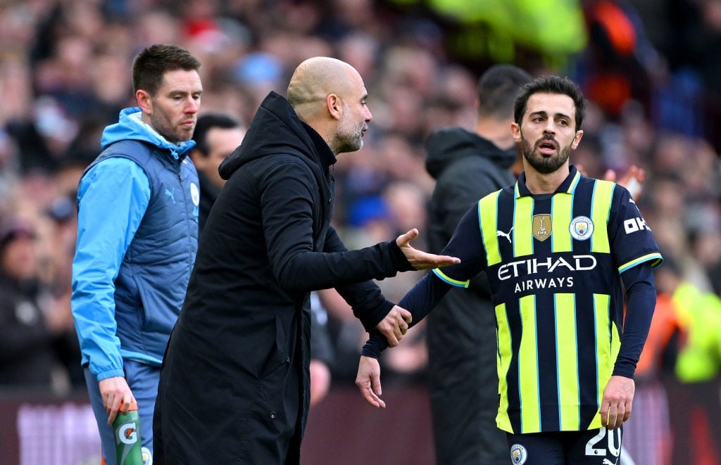 BIRMINGHAM, ENGLAND - DECEMBER 21: Pep Guardiola, Manager of Manchester City, reacts towards Bernardo Silva of Manchester City during the Premier League match between Aston Villa FC and Manchester City FC at Villa Park on December 21, 2024 in Birmingham, England. (Photo by Shaun Botterill/Getty Images)