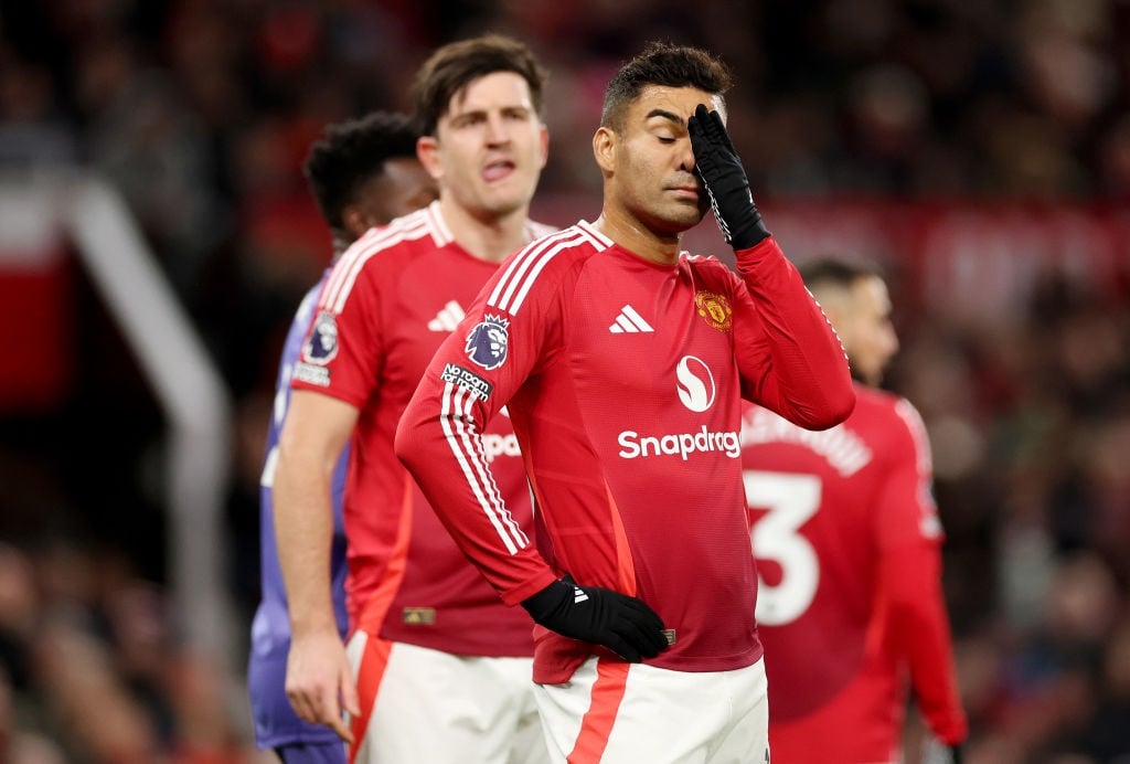 MANCHESTER, ENGLAND - DECEMBER 30: Casemiro of Manchester United looks dejected during the Premier League match between Manchester United FC and Newcastle United FC at Old Trafford on December 30, 2024 in Manchester, England. (Photo by Carl Recine/Getty Images)