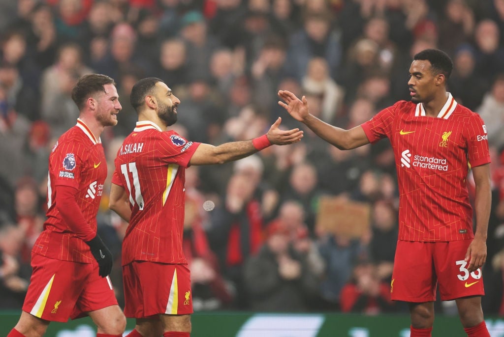 LIVERPOOL, ENGLAND - DECEMBER 26: Mohamed Salah of Liverpool (C) celebrates scoring his teams third goal with teammates Alexis Mac Allister (L) and Ryan Gravenberch (R) during the Premier League match between Liverpool FC and Leicester City FC at Anfield on December 26, 2024 in Liverpool, England. (Photo by Jan Kruger/Getty Images)