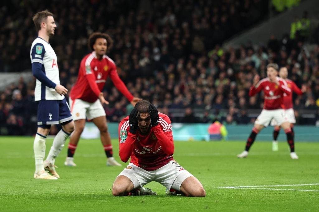 LONDON, ENGLAND - DECEMBER 19: Noussair Mazraoui of Manchester United reacts to a missed chance during the Carabao Cup Quarter Final match between Tottenham Hotspur and Manchester United at Tottenham Hotspur Stadium on December 19, 2024 in London, England. (Photo by Alex Pantling/Getty Images)