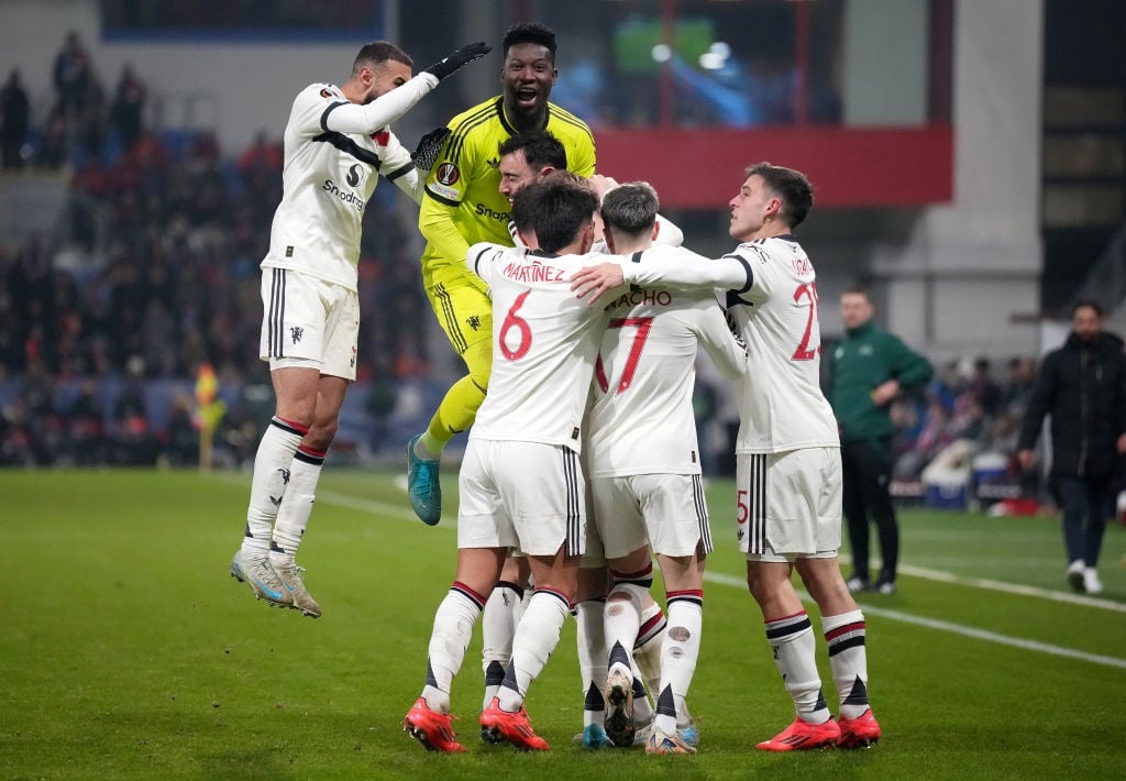 PLZEN, CZECH REPUBLIC - DECEMBER 12: Rasmus Hojlund of Manchester United (obscured) celebrates scoring his teams second goal with teammates during the UEFA Europa League 2024/25 League Phase MD6 match between FC Viktoria Plzen and Manchester United at Stadion mesta Plzne on December 12, 2024 in Plzen, Czech Republic. (Photo by Gabriel Kuchta/Getty Images)