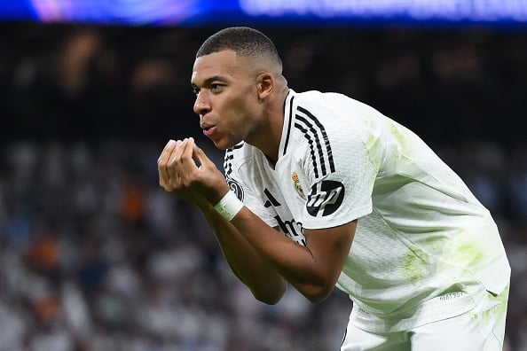 Kylian Mbappe has named Cristiano Ronaldo and Zinedine Zidane as players he wishes he could played against. 