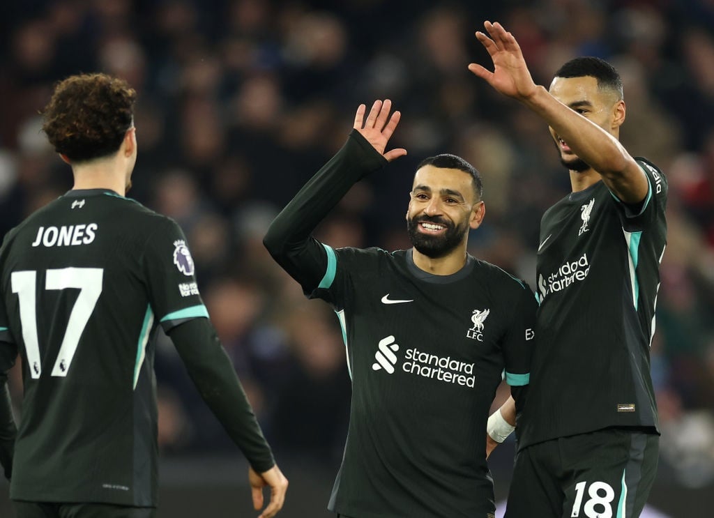 LONDON, ENGLAND - DECEMBER 29: Mohamed Salah of Liverpool celebrates scoring his teams third goal with teammates Cody Gakpo and Curtis Jones during the Premier League match between West Ham United FC and Liverpool FC at London Stadium on December 29, 2024 in London, England. (Photo by Richard Pelham/Getty Images)