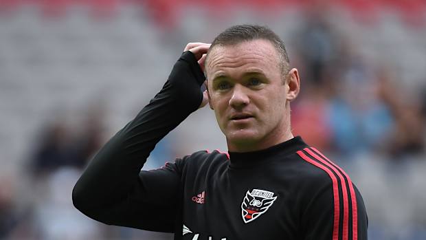 DC United forward Wayne Rooney (9) warms up before a game against the Vancouver Whitecaps at BC Place.