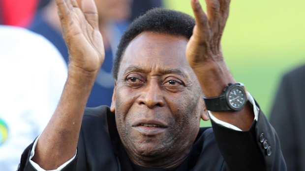 New York Cosmos former player Pele acknowledges the crowd during a ceremony before a match against Fort Lauderdale.