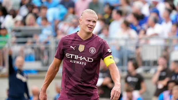 Manchester City forward Erling Haaland misses a shot on goal against Chelsea.