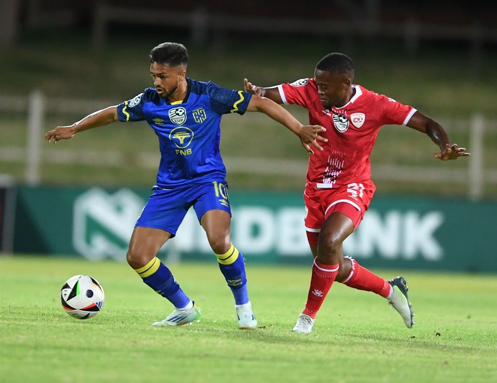 POLOKWANE, SOUTH AFRICA - JANUARY 27: Haashim Domingo of Cape Town City FC and Relebogile Mokhouane of Sekhukhune United during the Nedbank Cup, Last 32 match between Sekhukhune FC and Cape Town City FC at Old Peter Mokaba Stadium on January 27, 2025 in Polokwane, South Africa. (Photo by Philip Maeta/Gallo Images)