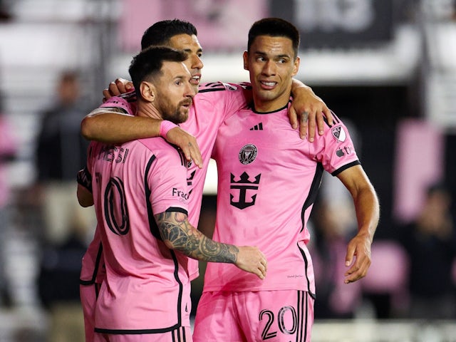 Inter Miami's Diego Gomez celebrates with teammates Lionel Messi and Luis Suarez on February 21, 2024