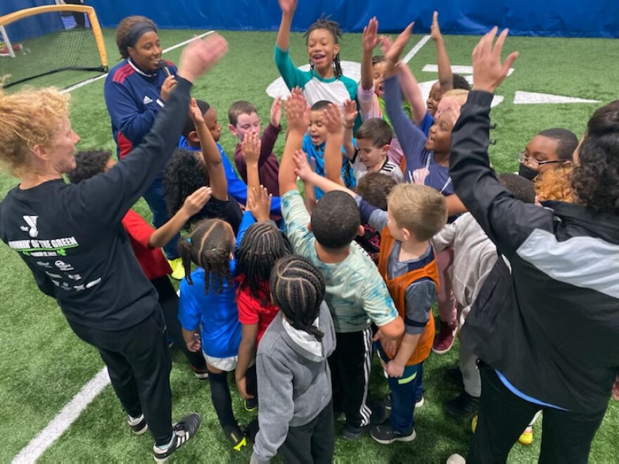 Children learn about the sport of soccer through the Rochester City Soccer League.